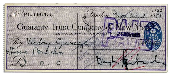 Check Signed by Douglas Fairbanks, Jr. -- 22 November 1955 -- Cancellation Stamps to Front & Verso -- Signature Slightly Smudged, Red Mark Across Signature -- Overall Very Good