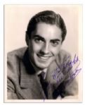 Tyrone Power Signed 5.5 x 7 Matte Photo -- Signed in Purple Ink: For Hutsie with Best Wishes / Tyrone Power -- Very Good