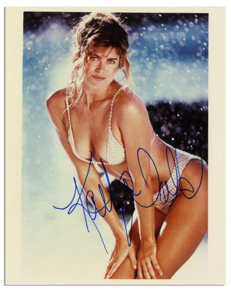 Kathy Ireland Signed Photo -- 8'' x 10'' Glossy of the Bikini Clad Supermodel -- Near Fine -- With Wehrmann COA