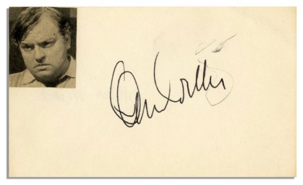 ''Orson Welles'' Signature in Black Ink on 5'' x 3'' Card With His Photo Affixed -- Pencil Scratch, Else Near Fine
