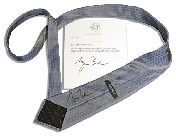 George W. Bush Personally Owned & Signed Tie & LOA -- ''...The blue...tie...has been donated from my personal wardrobe to the Youth for Christ fundraiser...''
