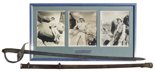 Errol Flynn Screen Used Rapier Sword From ''The Charge of the Light Brigade'' -- With A Handsome Framed Trio of Vintage Photos of Flynn Using The Sword On Set & In Costume