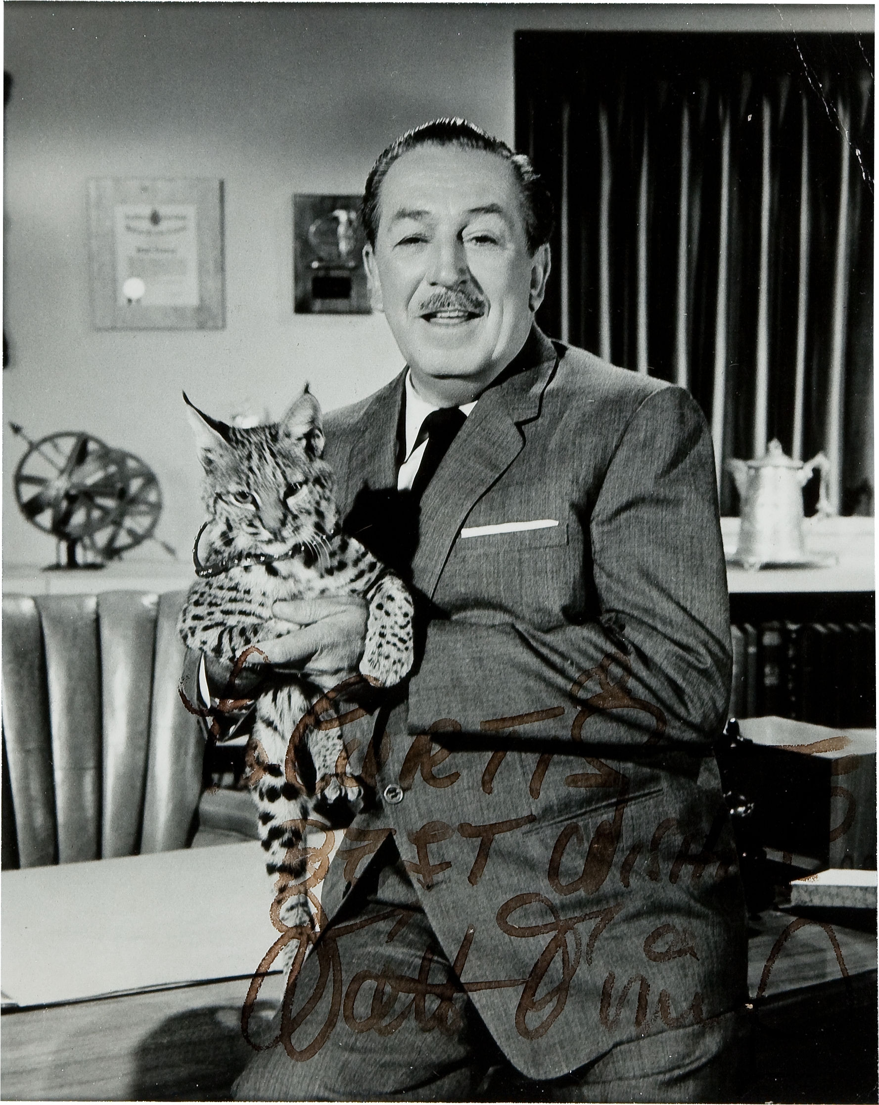 Walt Disney Autograph Unique Walt Disney 7.25'' x 9'' Signed Photo Where He Holds a Baby Lynx