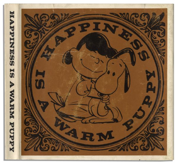 Charles Schulz Signed Book, His Classic ''Happiness is a Warm Puppy''