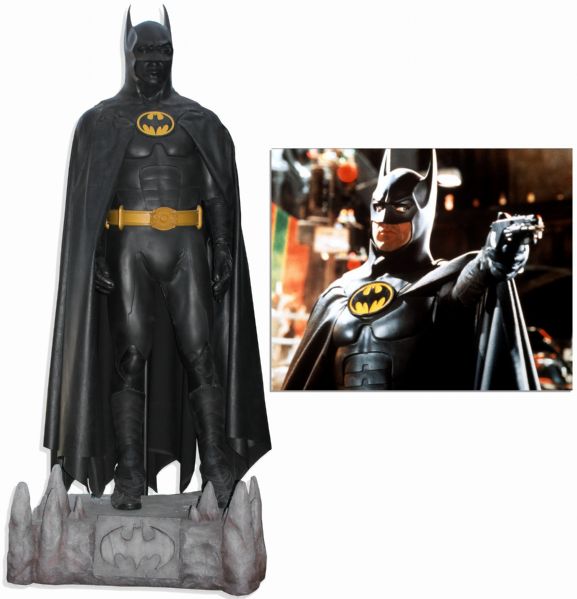 Batman Dark Knight prop Batman Dark Knight Memorabilia The Batsuit Worn by Michael Keaton in ''Batman'' From 1989 -- Measures Over 7' Tall on Custom Display