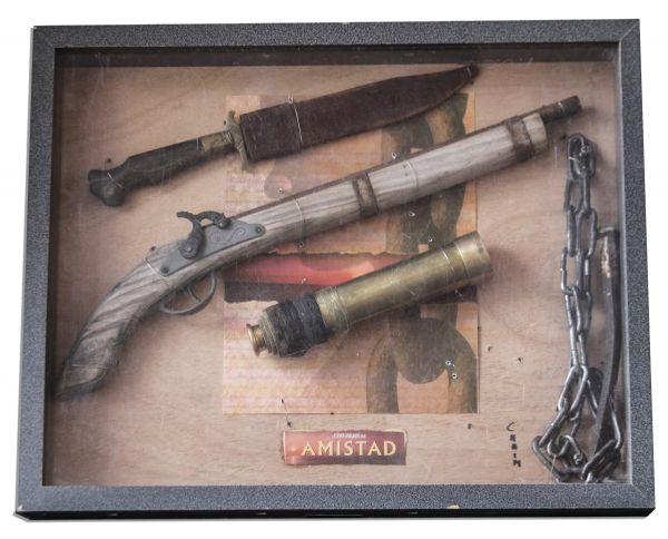 Lot of Items From The Release of ''Amistad'' -- The Shooting Script, A Ticket to The Screening at The Academy of Motion Picture Arts & Sciences, A Promo Sheet & Shadowbox Full of Prop Weapons
