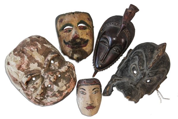 Ray Bradbury Owned Lot of 5 Masks -- Painted Mask With Goatee, Large Carved Wood Mask, Miniature Painted Mask, Porous Mask With Crested Head & African Guro Mask -- With COA From Estate