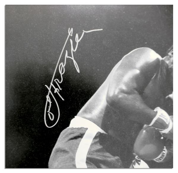 Muhammad Ali & Joe Frazier Limited Edition Photo Signed by Both -- Photo of The Fight of The Century, The Famed ''Thrilla in Manila'' World Heavyweight Championship Match -- With PSA/DNA COA
