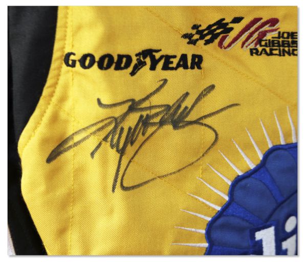 Kyle Busch Race-Worn & Signed Firesuit -- Worn at 2 NASCAR Sprint Cup Series Races in 2011