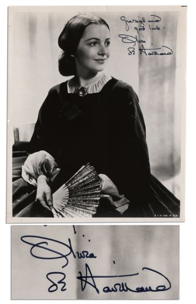 Olivia de Havilland 8'' x 10'' Signed Glossy Photo as ''Melanie'' -- ''Greetings and good luck / Olivia de Havilland'' -- Very Good