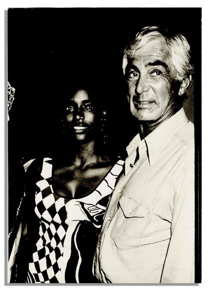 Unpublished 1986 Photo of John DeLorean & His Girlfriend by Famous Papparazzi Ron Galella -- With Ron Galella Backstamp -- 7'' x 10''