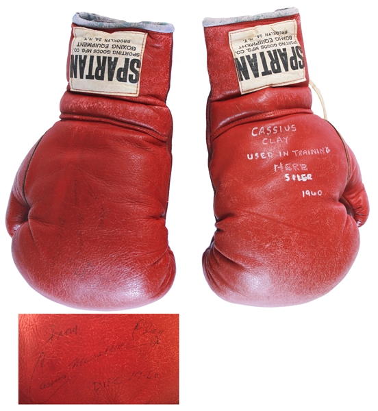 Cassius Clay, aka Muhammad Ali, Signed Boxing Gloves Used for His 2nd Professional Fight in 1960 -- Large Signature Measures Nearly 5'' Long, ''Cassius Marcellus Clay''