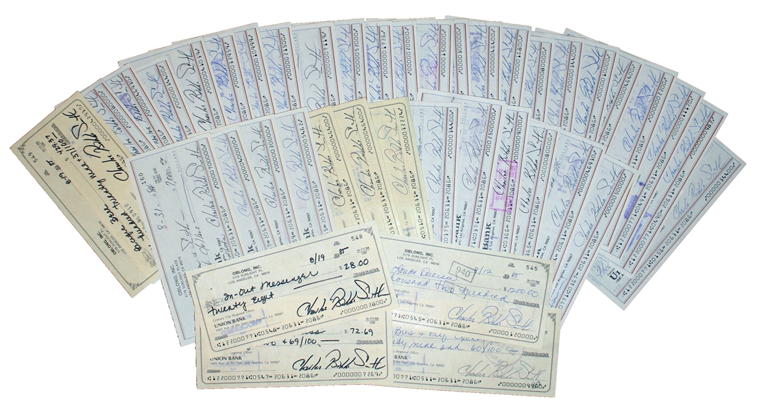 Lot of 50 Checks Signed ''Charles Bubba Smith'' by the Football Star -- Very Good Condition With Standard Bank Cancellation Marks