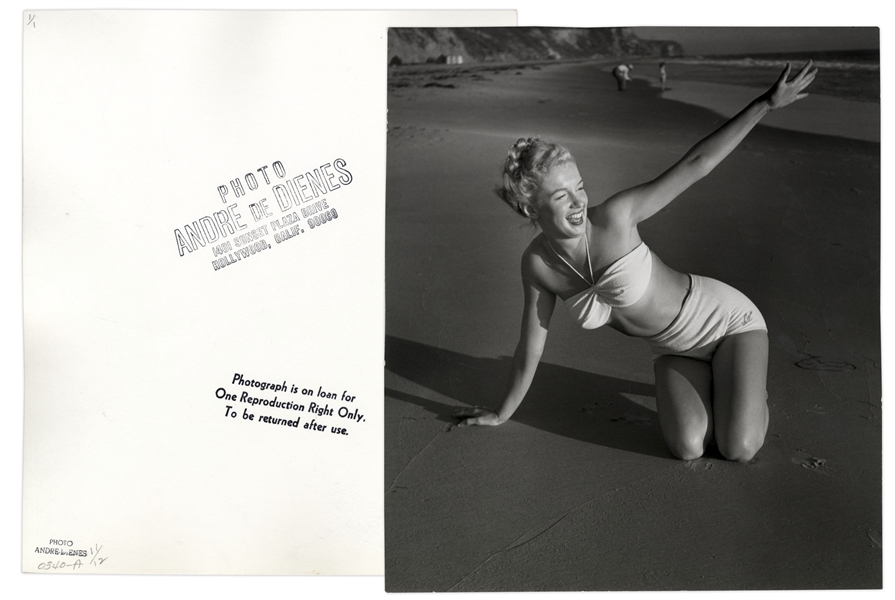 Original 1946 Photograph of Marilyn Monroe Taken by Andre de Dienes -- With de Dienes Backstamps, Developed by Him From His Negative -- Large Format Photo Measures 11'' x 12.25''