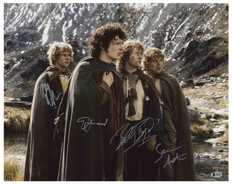 ''Lord of the Rings'' Cast-Signed 20'' x 16'' Photo -- Signed by Elijah Wood, Sean Astin, Billy Boyd and Dominic Monaghan -- With Beckett COA