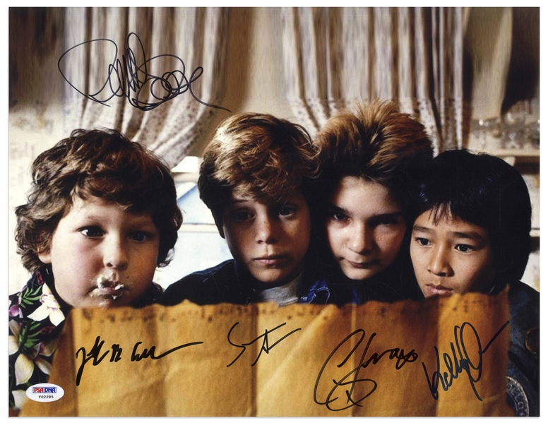 ''The Goonies'' Cast-Signed 14'' x 11'' Photo -- Signed by All Four Plus Director Richard Donner -- With PSA/DNA COA