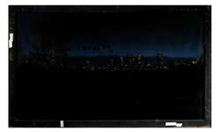 L.A. Story Screen-Used Matte Painting by Syd Dutton Showing Los Angeles at Night, With Backlighting on Reverse -- Large Painting Measures 70 x 42