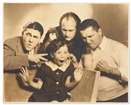 Photo of The Three Stooges Giving the Stooge Treatment to Moe Howards Daughter Joan