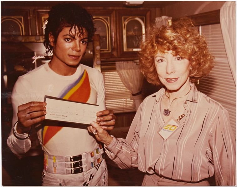 Four 8'' x 10'' Color Glossy Photos of Joan Howard Maurer and Michael Jackson Holding Three Stooges Memorabilia -- With MJJ Productions Stamp on Verso of Each -- Near Fine