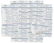 Lot of 84 Checks Signed Charles Bubba Smith by the Football Star -- Very Good Condition With Standard Bank Cancellation Marks on Verso
