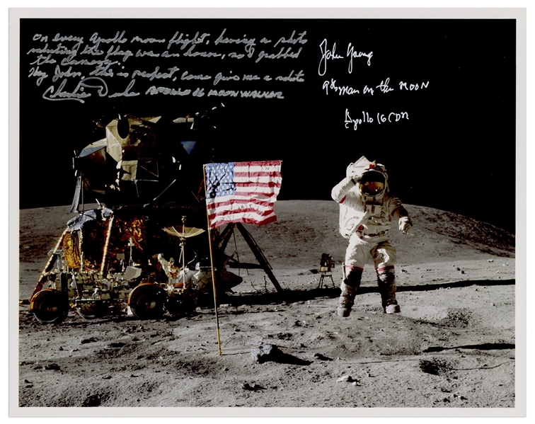John Young and Charlie Duke Signed 10'' x 8'' Lunar Photo of Young Saluting the U.S. Flag During the Apollo 16 Mission -- Duke Additionally Writes, ''Hey John...Come give me a salute''
