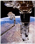 Astronaut Story Musgrave Signed 20 x 16 Photo of Musgrave Fixing the Hubble Space Telescope -- ...Science is...like poetry, it touches you...