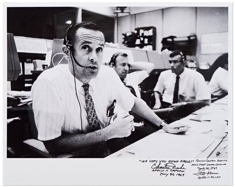 Charlie Duke and Fred Haise Signed 20'' x 16'' Photo of the Apollo 11 Mission Control -- Duke, the CAPCOM for Apollo 11, Writes ''WE COPY YOU DOWN EAGLE!''