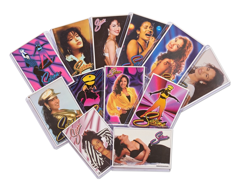 Lot of Items Related to Selena Quintanilla -- Includes Two 1996 Catalogs from Her Clothing Line, 1994 Fashion Show Publication, Branded Key Ring, Photos & More