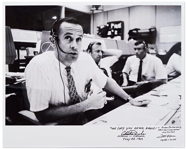 Charlie Duke and Fred Haise Signed 20'' x 16'' Photo of the Apollo 11 Mission Control -- Duke, the CAPCOM for Apollo 11, Writes ''WE COPY YOU DOWN EAGLE!''