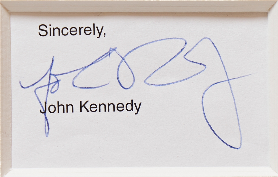 The Kennedy Family Signed Display Showing JFK Jr. Saluting His Father's Casket -- Signed by Jackie, Caroline, John Jr., Ted and Bobby Kennedy -- With PSA/DNA COAs for All, Measures 21.75'' x 31.75''