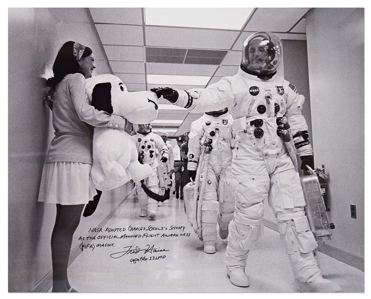 Fred Haise Signed 20'' x 16'' Photo of Apollo 10 Commander Tom Stafford Tapping Snoopy's Nose Before the Mission -- Haise Writes: ''NASA adopted Charles Schulz's Snoopy as the official...mascot''