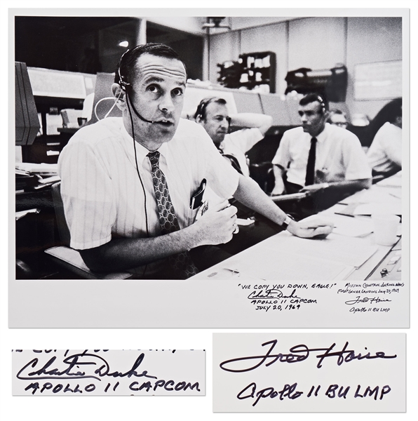 Charlie Duke and Fred Haise Signed 20'' x 16'' Photo of the Apollo 11 Mission Control -- Duke, the CAPCOM for Apollo 11, Writes ''WE COPY YOU DOWN EAGLE!''