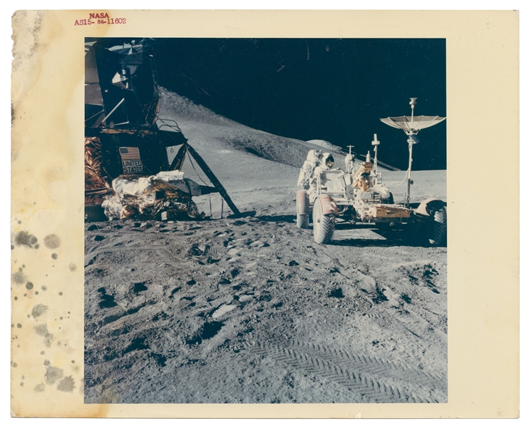 Neil Armstrong and Scott Carpenter Signed ''First Lunar Landing'' Book -- With Steve Zarelli COA -- Also Includes 3 Apollo 15 Red Number Photos Including Dave Scott Saluting the U.S. Flag on the Moon