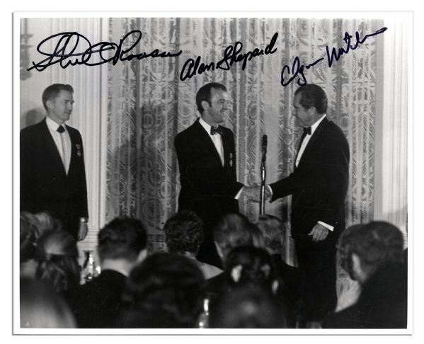 Apollo 14 Crew Signed 10'' x 8'' Photo -- Edgar Mitchell, Stu Roosa & Alan Shepard -- Photo Depicts Shepard Shaking President Nixon's Hand After Successful Mission