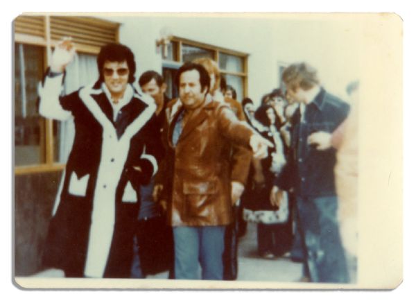 Candid Photo of Elvis Presley in a Flashy Coat