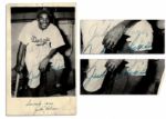 Hall of Famer Jackie Robinson Twice-Signed Photo Postcard -- With PSA/DNA COA for Both Signatures 