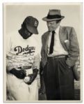 Jackie Robinson Signed Photo -- 8'' x 10'' Photo of Robinson & Actor Van Heflin, Dedicated in Robinson's Hand to the Actor -- With PSA/DNA COA