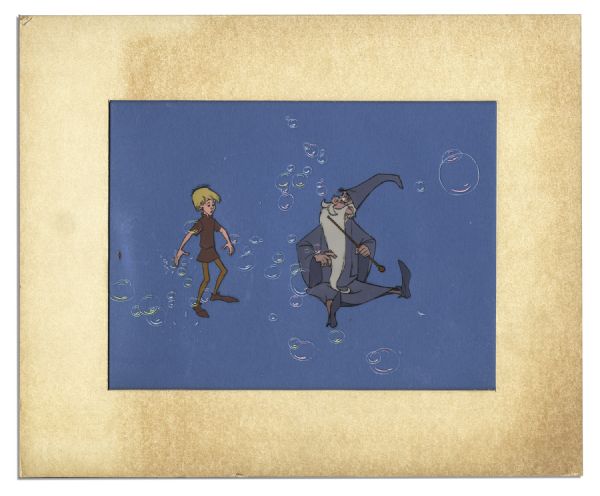 Ray Bradbury Owned Disney Animation Cel From ''The Sword in the Stone'' Featuring Merlin & Arthur -- Disney COA on Verso -- Measures 12'' x 10'' -- Near Fine -- With COA From Estate