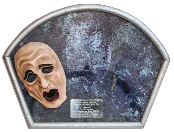 Ray Bradbury Owned Lot of 3 Masks From ''Something Wicked This Way Comes'' Play -- 2 Papier-Mache Masks and 1 Affixed to Award Plaque, Measures 26'' x 19'' -- Near Fine -- COA From Estate