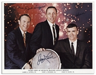Pair of James Lovell 8'' x 10'' Photos Signed -- One Photo of Lovell in His Spacesuit & One Crew Photo of the Apollo 7 Astronauts in Civilian Suits