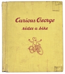 Curious George First Edition, Signed by H.A. Rey with Original Ink Drawing -- ''Curious George Rides a Bike'' From 1952