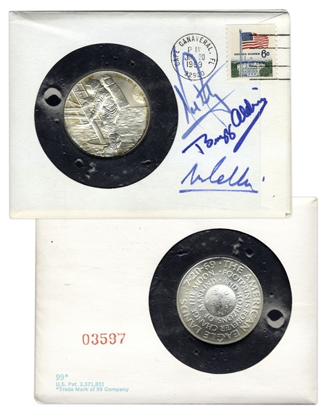 Apollo 11 Cover Signed by Neil Armstrong, Buzz Aldrin & Michael Collins -- With ''Man on the Moon'' Silver Medal & With COA From Steve Zarelli