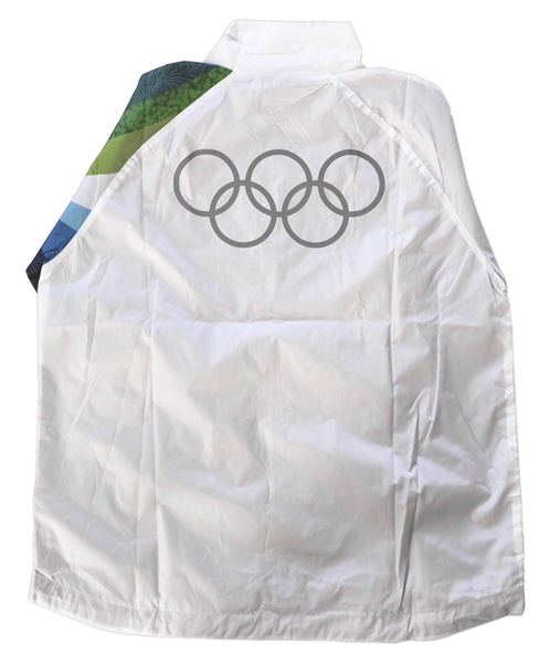 Olympic Torch Used in 2010 Vancouver Winter Games -- With Official 3 Piece Outfit