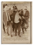 James Earl Ray 8 x 11 Glossy Press Photo -- Photo Shows Martin Luther King Jr.s Assassin Being Escorted to Prison -- Very Good Condition