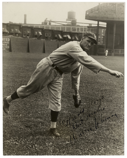 Walter Johnson 7.5'' x 9.5'' Signed Photo Shown Pitching -- Inscribed to Hollywood Legend Harold Lloyd -- Scarce