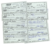 Lot of 10 Arthur Ashe Signed Checks -- From the Arthur Ashe Estate
