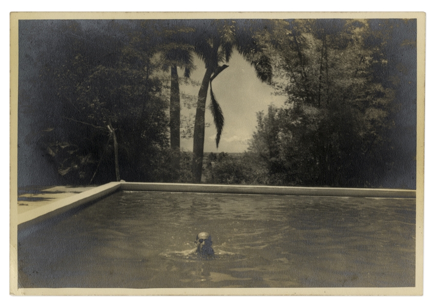 Photograph of Roberto Hererra, Ernest Hemingway's Close Friend, Swimming in Hemingway's Pool at His Home in Cuba