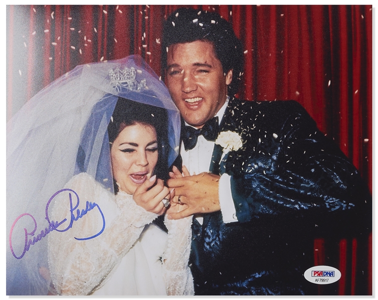 Priscilla Presley Signed 10'' x 8'' Photo -- Showing Her & Elvis on Their Wedding Day, Being Pummeled With Rice -- With PSA/DNA COA