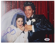 Priscilla Presley Signed 10 x 8 Photo -- Showing Her & Elvis on Their Wedding Day, Being Pummeled With Rice -- With PSA/DNA COA