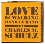 Charles Schulz Signed ''Peanuts'' Book, ''Love Is Walking Hand in Hand''